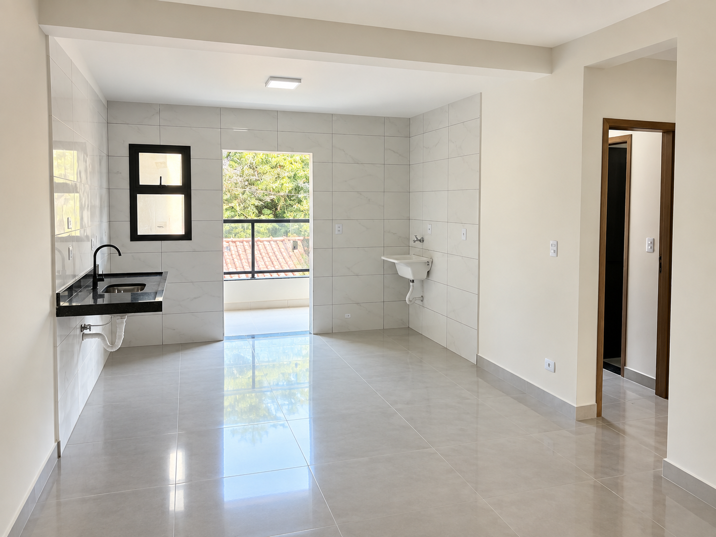 Sala integrada com cozinha e varanda, unidade nova do Terra Santa, Perequê-Açu